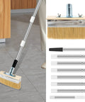 All In One Deck Stain Brush Kit With 67 Inch Extendable Handle, 8 Section Adjustable Pole on floor showing bristle