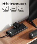 Slick Flat Plug Surge Protector Power Strip With Hella Outlets And Fast USB Charging, 12 AC outlets and 2 USB-C ports on desk.