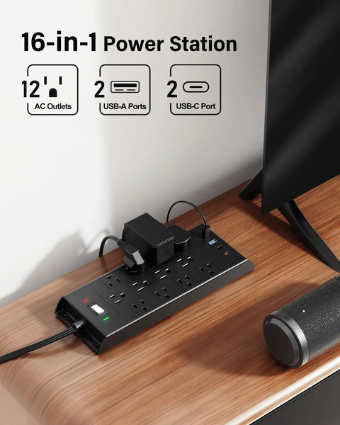 Slick Flat Plug Surge Protector Power Strip With Hella Outlets And Fast USB Charging, 12 AC outlets and 2 USB-C ports on desk.