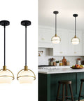 Yuniexuber 2 Pack Modern Mid Century Globe Pendant Lights, Brass Gold and Black above kitchen island with milk white glass shades.
