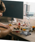 LED Magnifying Lamp With Magnifying Glass Holder For Soldering Circuit Boards Sturdy Third Hand Tool on a workbench