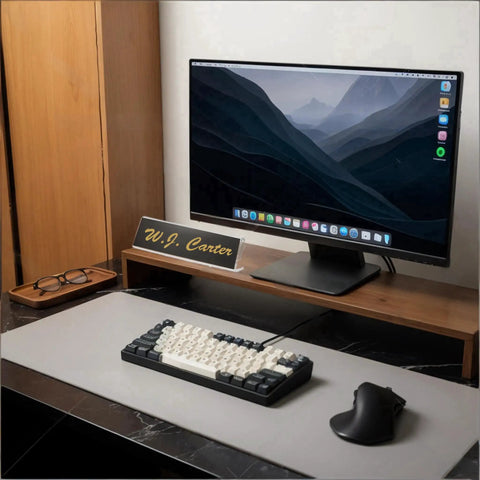 Desktop setup with Clear Acrylic Desk Name Plates 12 Pack With Horizontal Slant Back 2x8 Sign Holders on table.