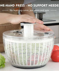 Person using Big Ol 6.3 Qt Salad Spinner with fully removable lid, one-hand press pump, instant stop brake, and retractable handle.