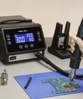 Person using Powerful 1000W Touch Screen Rework Station With Rapid Heating 212F To 932F Range on a circuit board