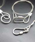 Vinyl Coated Stainless Steel Cable Lanyards With Double Loop Ends Six Inch Length Three Millimeter Wire Diameter Twenty Pack Ultra Durable Heavy Duty Safety Tethers For Tools And Outdoor Gear, shown with metal hooks on black surface.