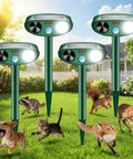 Solar Ultrasonic Animal Repellent With Motion Sensor And Bright LED Flash Light For Yard Garden Farm Outdoor Use IP66 Waterproof Scares Deer Cats Squirrels Raccoons And Critters Weatherproof 4 Pack in lawn