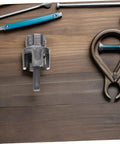 Awesome Electric Pipe Thread Cutter Kit For PvC & Metal tool, 1 inch size, steel housing for cutting pipes on a wooden surface.