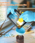 Person using Must-Have 7-Piece UV Resin 3D Printer Cleaning Kit With Silicone Spatulas, Scrapers, And Brushes For Resin Transfer