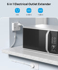 6 in 1 electrical outlet extender powering a microwave on a kitchen counter