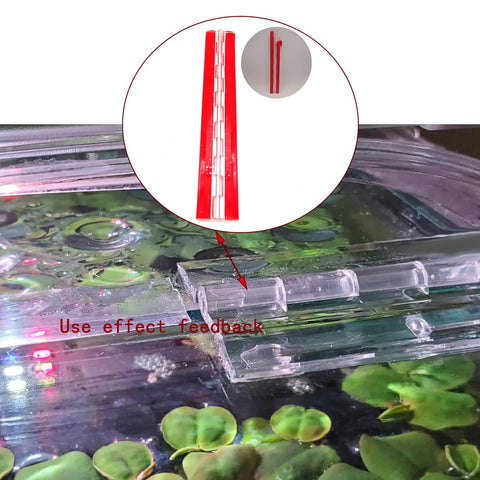 Acryl-Hinge 300mm transparent acrylic piano hinge with self-adhesive backing, shown on an aquarium lid.