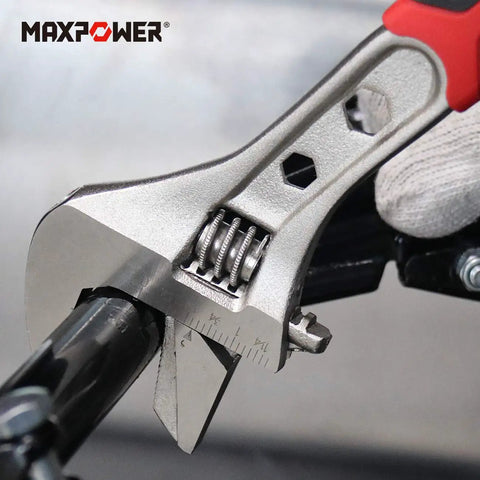 4 Piece Adjustable Wrench Set With Reversible Jaw And Box End Hex Function in use on a pipe