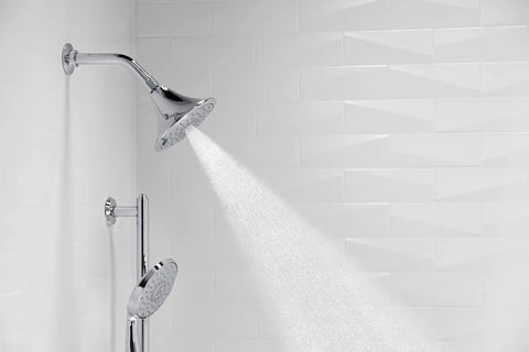 Forte Three Spray Settings Wall Mount Showerhead in Vibrant Brushed Bronze with full coverage spray in a tiled shower