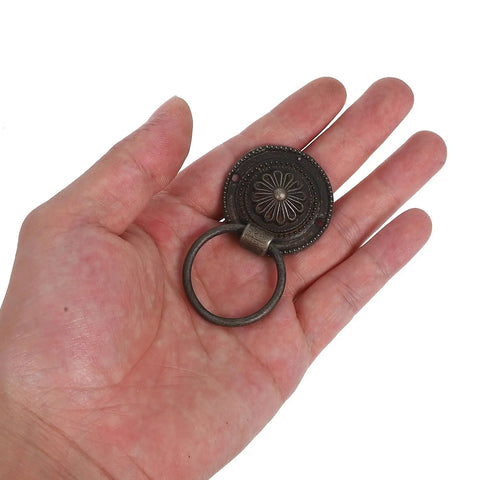 12 Pack Retro Bronze Ring Pulls For Drawers And Cabinets Dope Vintage Drop Knobs Zinc Alloy Hardware in hand for scale