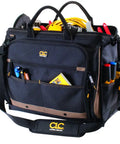 Heavy Duty Tool Bag With 50 Pockets And Large Center Compartment, Multi-Compartment Tool Organizer For Power Tools, Zippered Spill Proof Design, Durable Construction For Trade Pros filled with tools and cables.