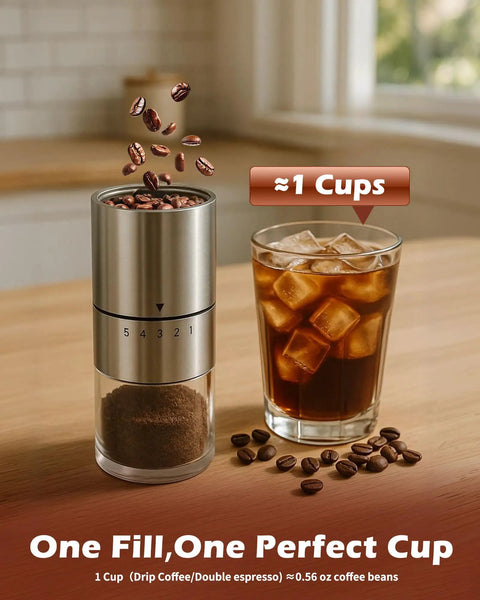 Manual Coffee Grinder With Ceramic Burrs For Espresso And French Press, Five Adjustable Settings, hand crank, stainless steel next to iced coffee