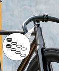 Eight Piece Aluminum Bike Headset Spacers Set For One And One Eighth Inch Stems With 2mm 3mm 5mm And 10mm Spacers on bike