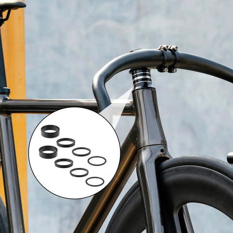 Eight Piece Aluminum Bike Headset Spacers Set For One And One Eighth Inch Stems With 2mm 3mm 5mm And 10mm Spacers on bike