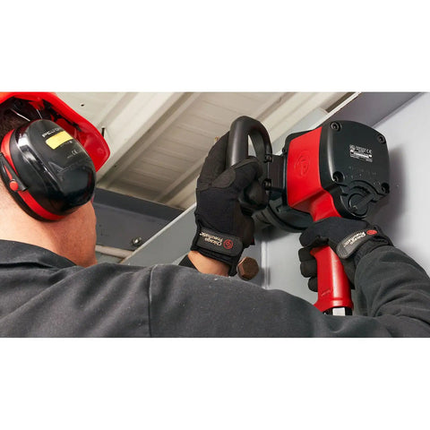 Pro Power One Inch Drive Air Impact Wrench Featuring Lightweight Aluminum Body in use to loosen a bolt.