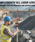 Man holding Heavy Duty Aluminum Laser Grade Rod on a construction site, used for grading and surveying tasks.