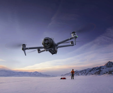 Mavic 4 Pro Drone Fly More Kit With RC 2 Controller, 100MP Hasselblad Camera, flying in snowy landscape at sunset