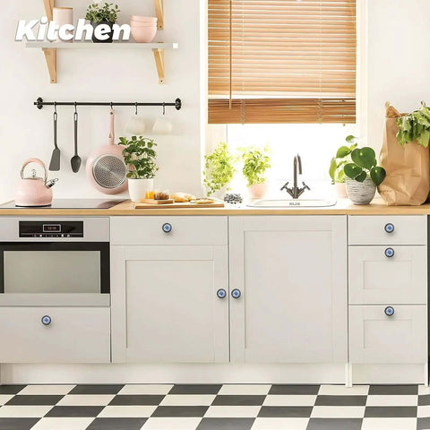 Blue Peony Flower Cabinet Knobs Set, 12 Pack For Kitchen And Bathroom on white cabinets in a sunny kitchen.