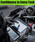 Mechanic using tablet in engine bay wearing 10 Mil Nitrile Gloves Large Disposable Heavy Duty Work Gloves With Raised Diamond Texture.