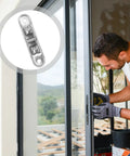Heavy Duty 4 Pack Window Sash Pulley Wheels With Double Bearing Nylon Rollers For Smooth As Butter Gliding Sliding Doors And Glass Tracks in use during installation.