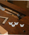 Close-up of 20 Pcs Stainless Steel Quick Release Shutter Fasteners with bolts on a wooden workbench