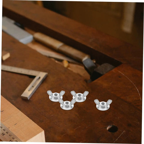 Close-up of 20 Pcs Stainless Steel Quick Release Shutter Fasteners with bolts on a wooden workbench