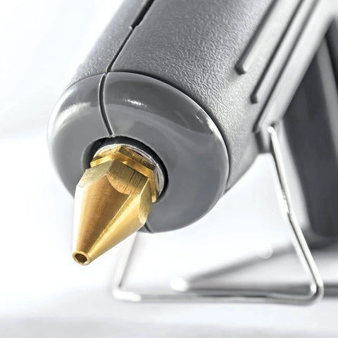 Close-up of a Heavy Duty Full Size High Output Hot Melt Glue Gun Pro Grade For Carpentry Repairs And Remodeling Grey 200 Watts DIY Ready