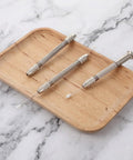 Top Shelf 3 Piece Pin Vise Set Featuring Double Ended Hand Drills With Solid Brass Chucks on a wooden tray.