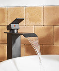 Matte Black Bathroom Vessel Sink Faucet Tall Deck Mount With Pop Up Drain Single Handle Single Hole Vanity Lavatory Faucet Brass Construction Includes Supply Lines And Hose with water flowing into sink