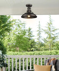 One Light Semi Flush Mount Outdoor Ceiling Light In Oil Rubbed Bronze Finish Vintage Industrial Farmhouse Style Fixture on porch