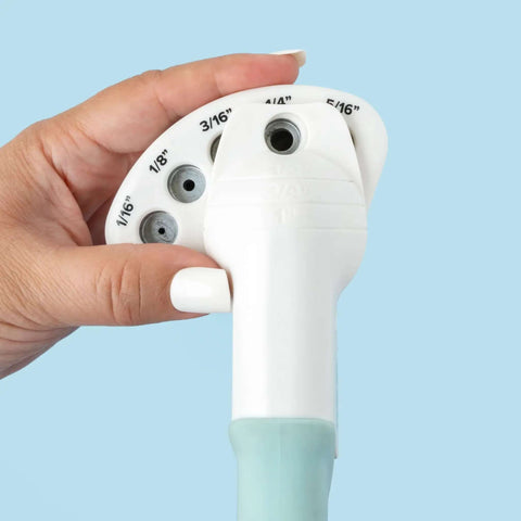 Close-up of Multi Size Hole Punch for Leather, Paper, Fabric with hand rotating to 5/16 inch hole size for crafting projects.