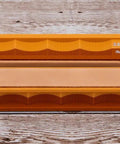 5/3.5 Micron Diamond And Leather Strops Pack For Knife Sharpening on wooden table with syringes