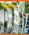 Heavy Duty 3/4 Inch Heat Shrink Label Tubes 18057 on organized electrical wiring with white labels showing identifies.