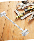 Beefy Heavy Duty Hinge Adjustment Wrench Tool For Door Repair on wooden table with tools, precise hinge gap alignment spanner visible