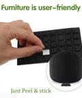 Eighty Piece Half Inch Square Self Adhesive Silicone Rubber Feet With Killer Non Slip Grip For Furniture Electronics And Appliances No Mess Peel Stick Bumper Pads That Hold Firm being peeled from a sheet for easy application.