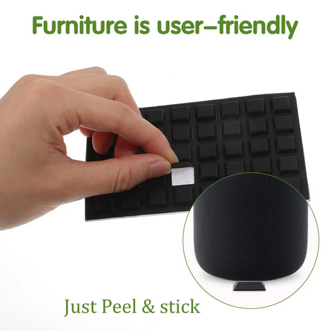 Eighty Piece Half Inch Square Self Adhesive Silicone Rubber Feet With Killer Non Slip Grip For Furniture Electronics And Appliances No Mess Peel Stick Bumper Pads That Hold Firm being peeled from a sheet for easy application.
