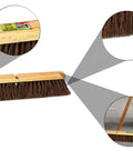 Heavy Duty 18 Inch Palmyra Bristle Push Broom For Garage Indoor Floor Sweep with wooden block and bristles in use.