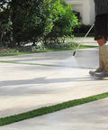 Premium Two Part Urethane Paver Sealer application on stone patio with pressure washer to enhance outdoor color.