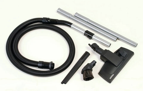 Professional Grade Heavy Duty Canister Vacuum With Smooth Suction Power And Dead Silent Motor Featuring Certified HEPA Filters Plus Zero Fuss Cord Swap For Easy Daily Cleanup accessories including black hose and silver rods.
