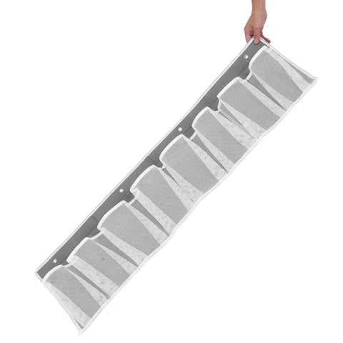 Compact Mesh Shoe Storage Hangs Beside Bed With 4 Hooks For RV Camper And Home To Stash Sneakers And Boots While Keeping Floors Tidy with gray fabric and mesh pockets.
