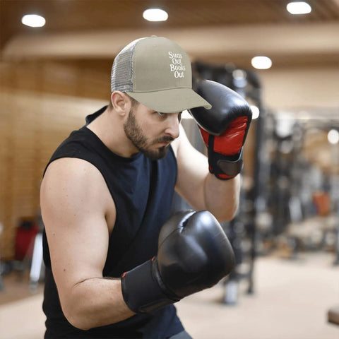 Man wearing Apricot Low Profile Trucker Hat For Men And Women Breathable Cotton Cap With Six Air Holes Lightweight