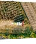 Epic Aerial View Of A Combine Harvester Harvesting Maize Canvas Wall Art 24x48 In Gallery Wrapped Canvas Print showing farmland