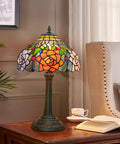 Tiffany Style Stained Glass Table Lamp 12 Inch Shade Multicolor Red Orange Purple Pink Rose Bedside Nightstand Reading Desk Light Vintage Retro Decor Led Bulb Included on wooden table with book and teacup