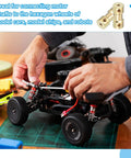Front view of four brass 3mm-to-3mm shaft couplings for RC car motors during assembly