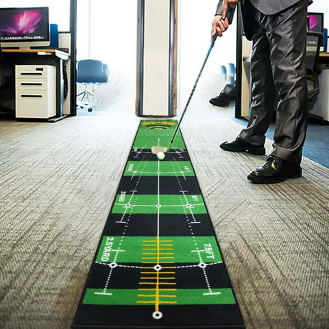 Person using Ten Foot By Twenty Inch Golf Putting Green Mat With Multi Distance Markers Anti Slip Backing in office setting