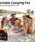 Powerful Battery Powered Camping Fan With 20000mAh Battery Rechargeable Outdoor Tent Fan next to people on beach