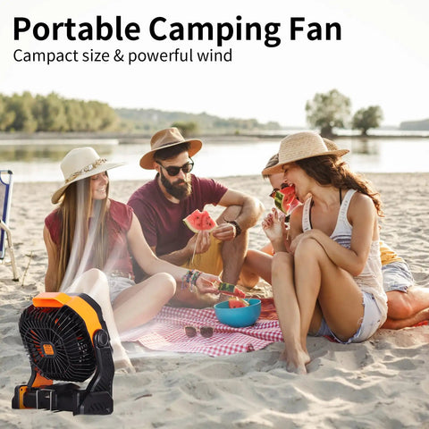 Powerful Battery Powered Camping Fan With 20000mAh Battery Rechargeable Outdoor Tent Fan next to people on beach